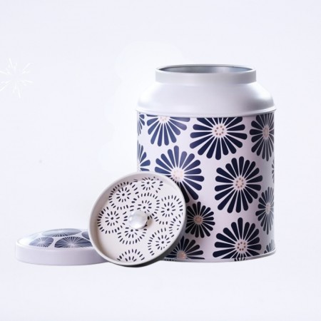 Boîte de thé vide "amami" de couleur crème au motif floral bleu et jaune